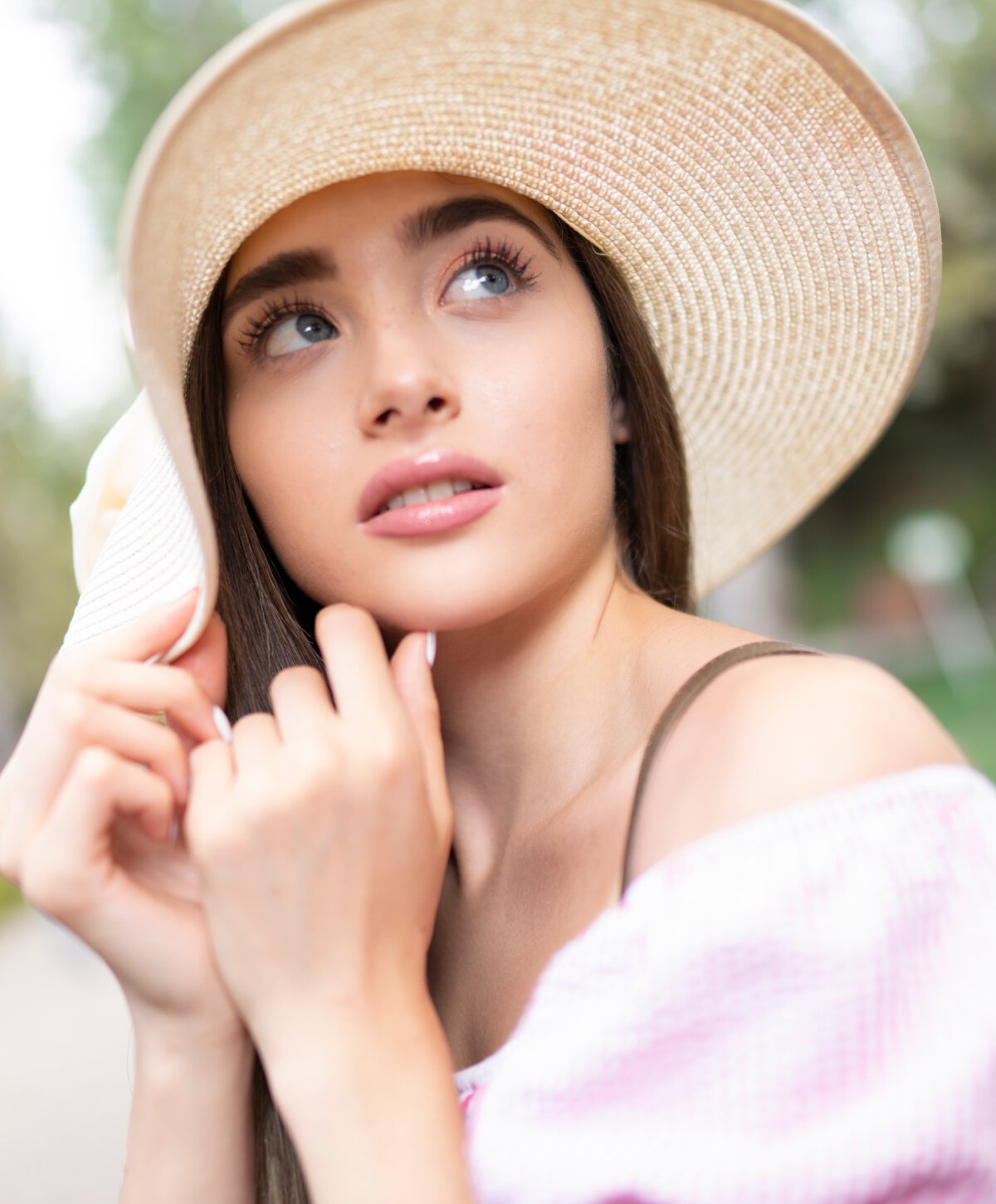 Carolina med spa model with tan hat